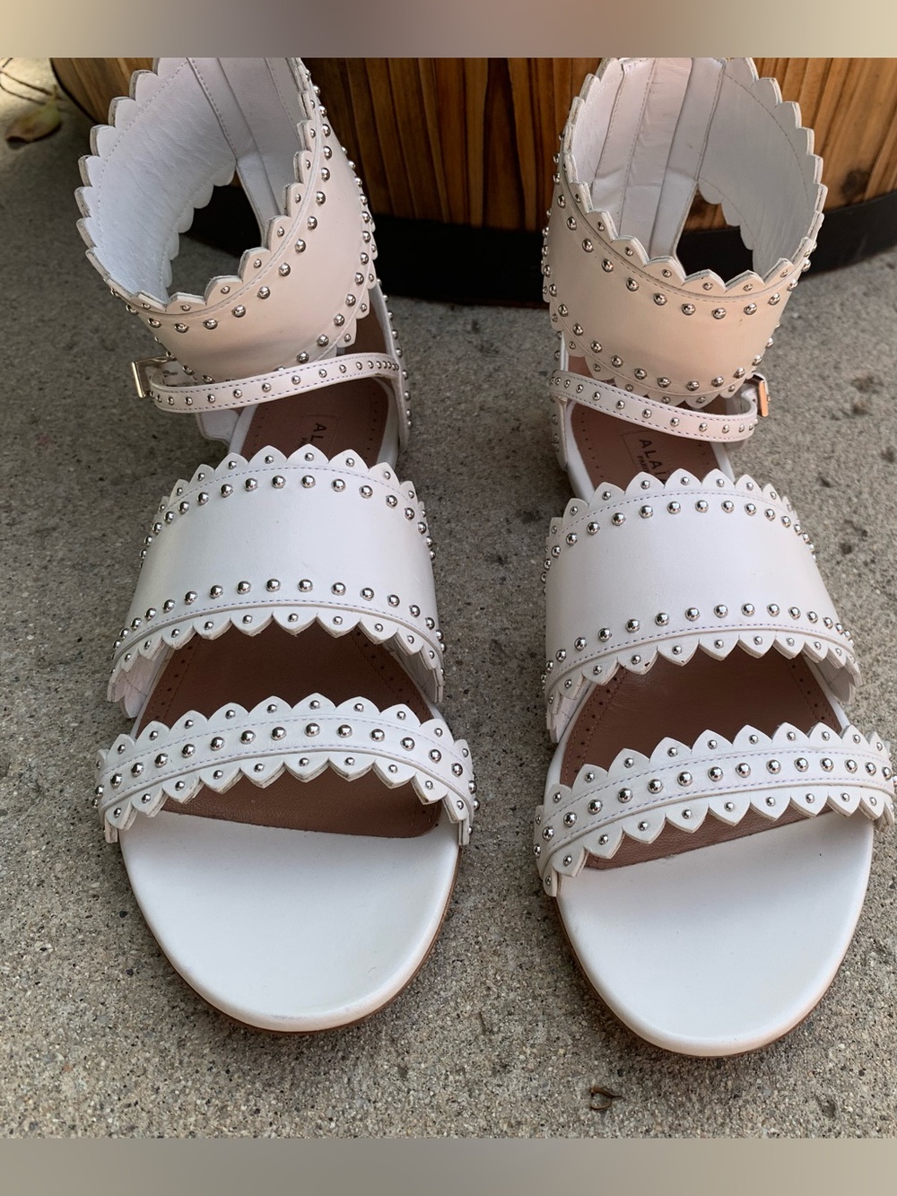 Alaia Studded Gladiator Sandals in White